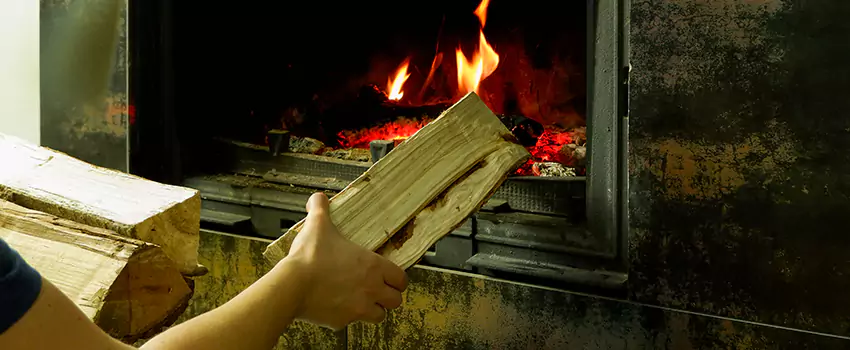 Wood Stove Heat Resistant Wall Repair in Boucherville, Quebec